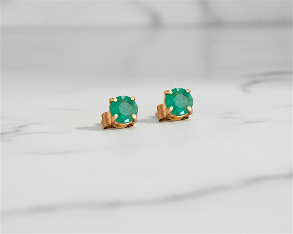 modern round claw set emerald studs in 9ct yellow gold for sale in Leeds