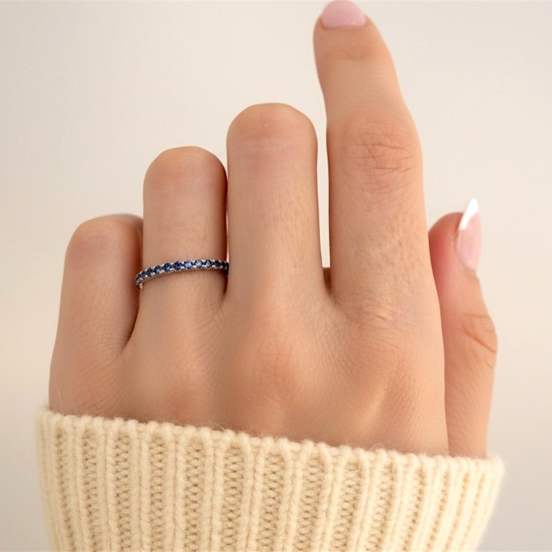 modern sapphire stacking ring in 9ct white gold for sale in Leeds UK, on hand