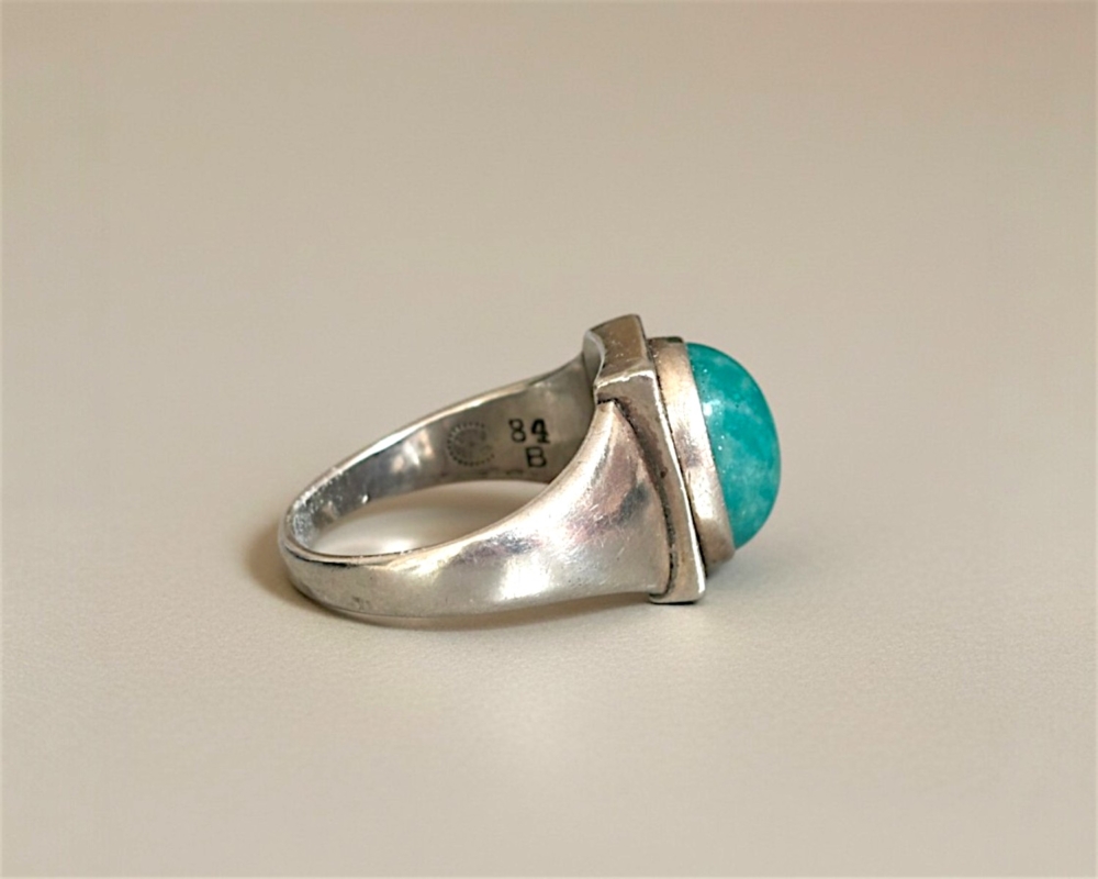Antique Georg Jensen silver and turquoise ring circa 1920s for sale in Leeds, UK, side view