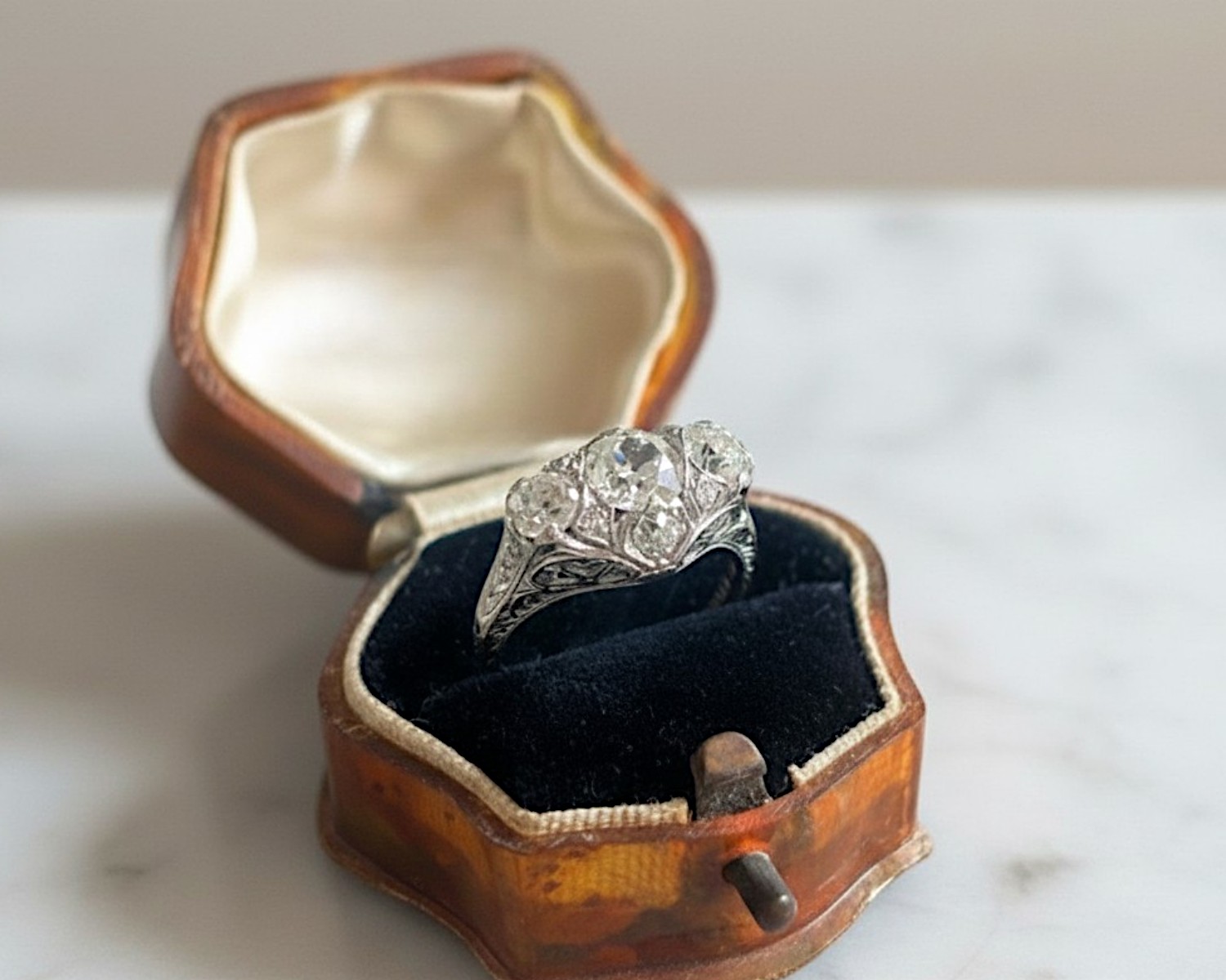 three stone ring in box
