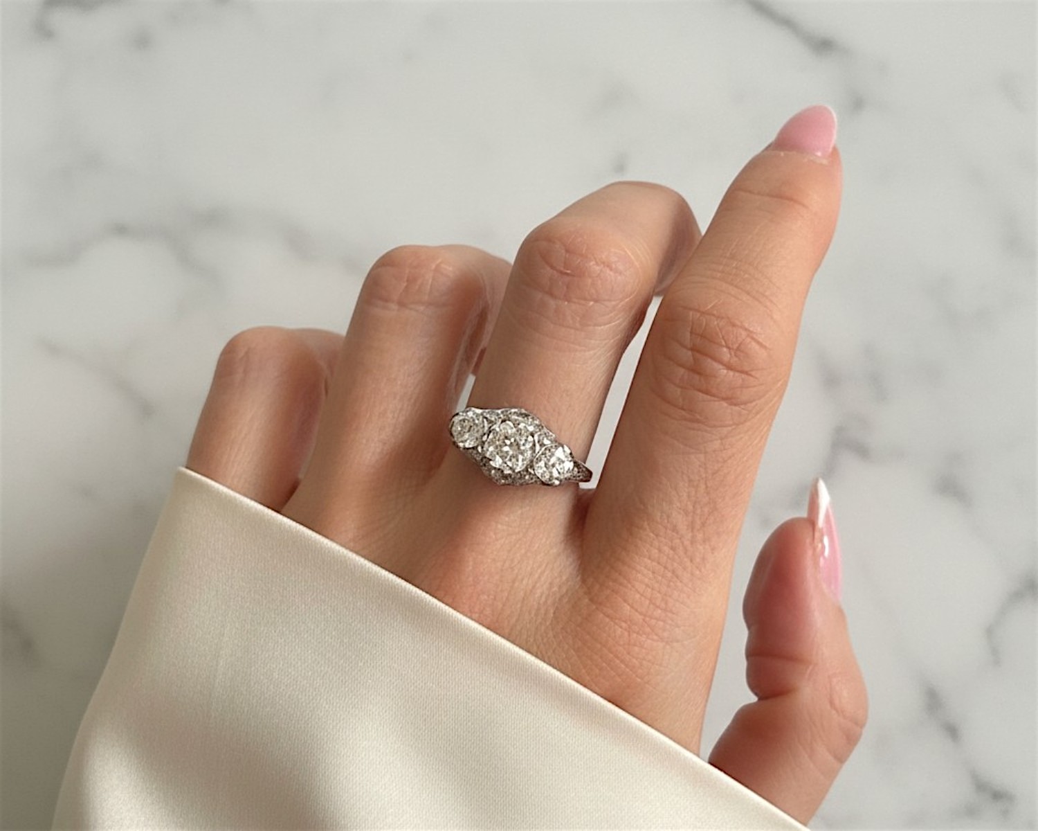 three stone ring on hand
