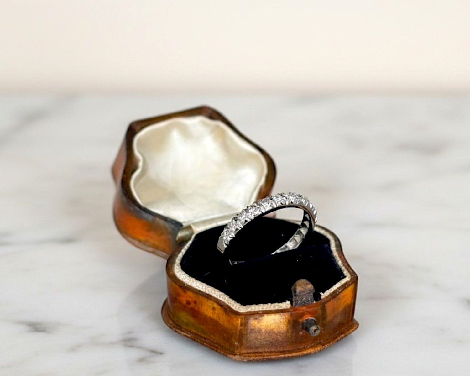 white gold half eternity ring in box