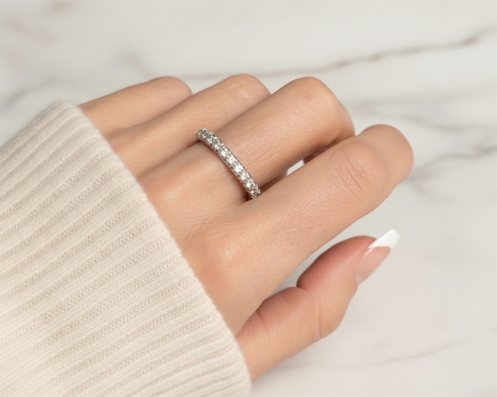 vintage diamond half eternity ring in 18ct white gold for sale in Leeds and shown here on a model's hand