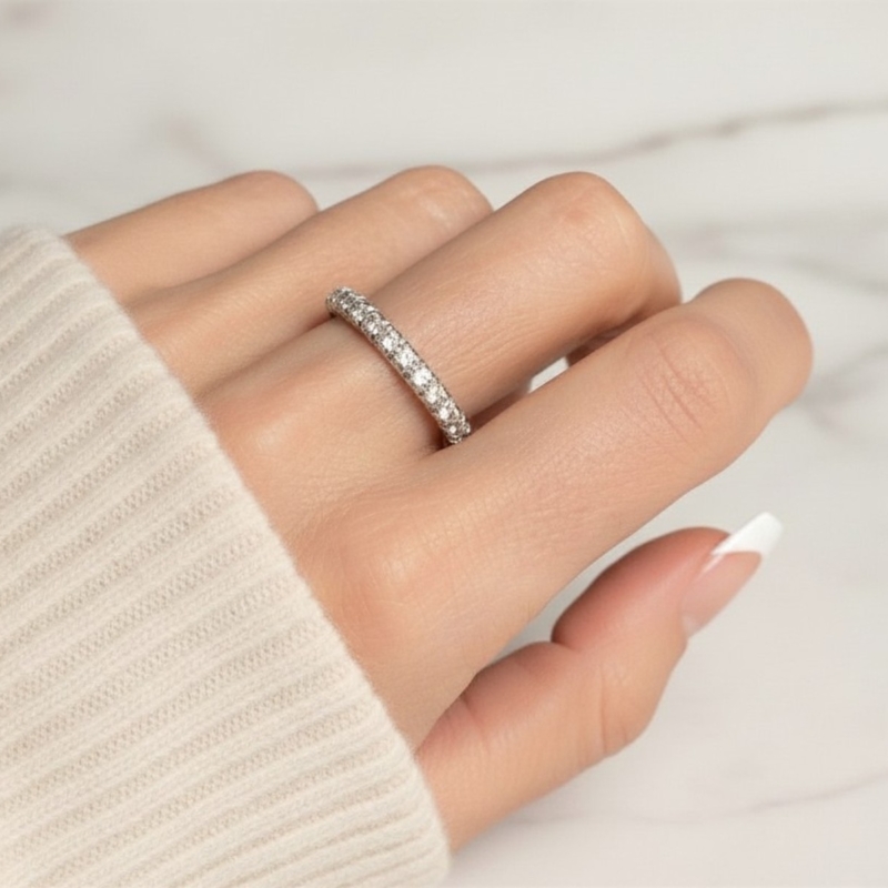 vintage diamond half eternity ring in 18ct white gold for sale in Leeds and shown here on a model's hand