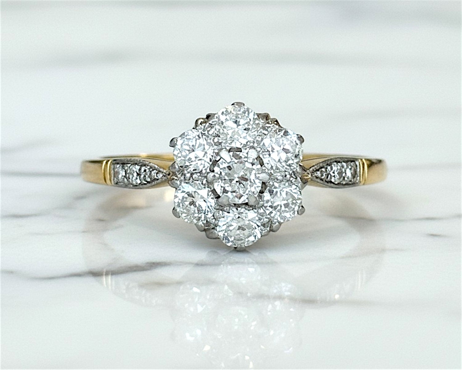Antique Art Deco diamond cluster ring with old cut diamonds in 18ct yellow gold and platinum set, for sale in Leeds UK