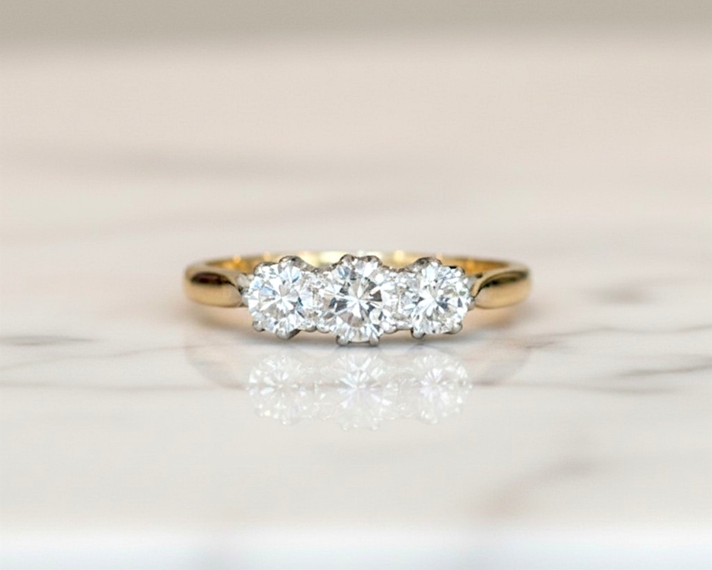 Antique 1930s diamond three stone ring in 18ct yellow gold and platinum for sale in Leeds