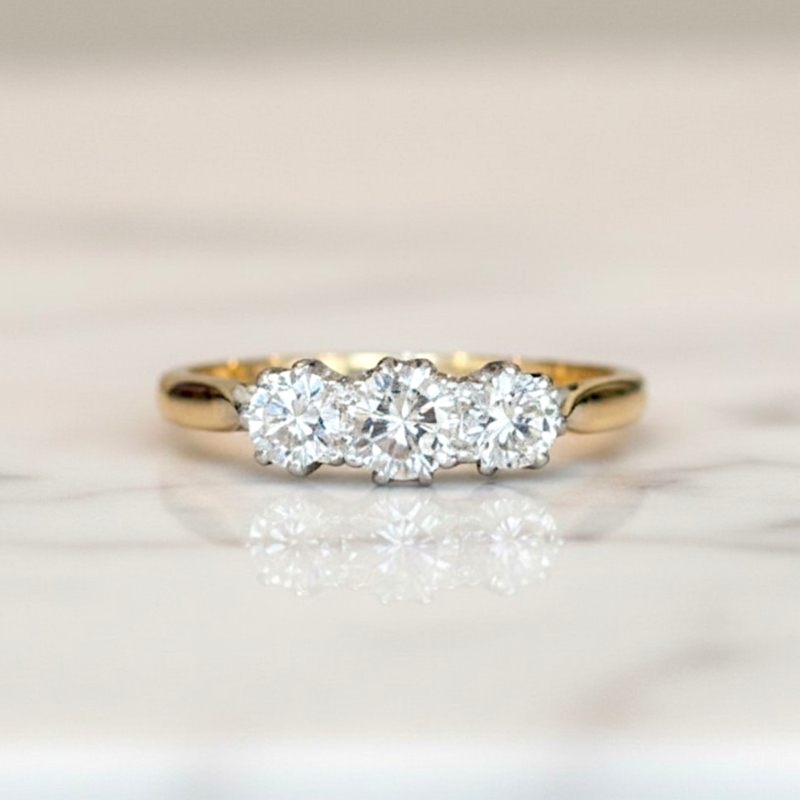 Antique 1930s diamond three stone ring in 18ct yellow gold and platinum for sale in Leeds