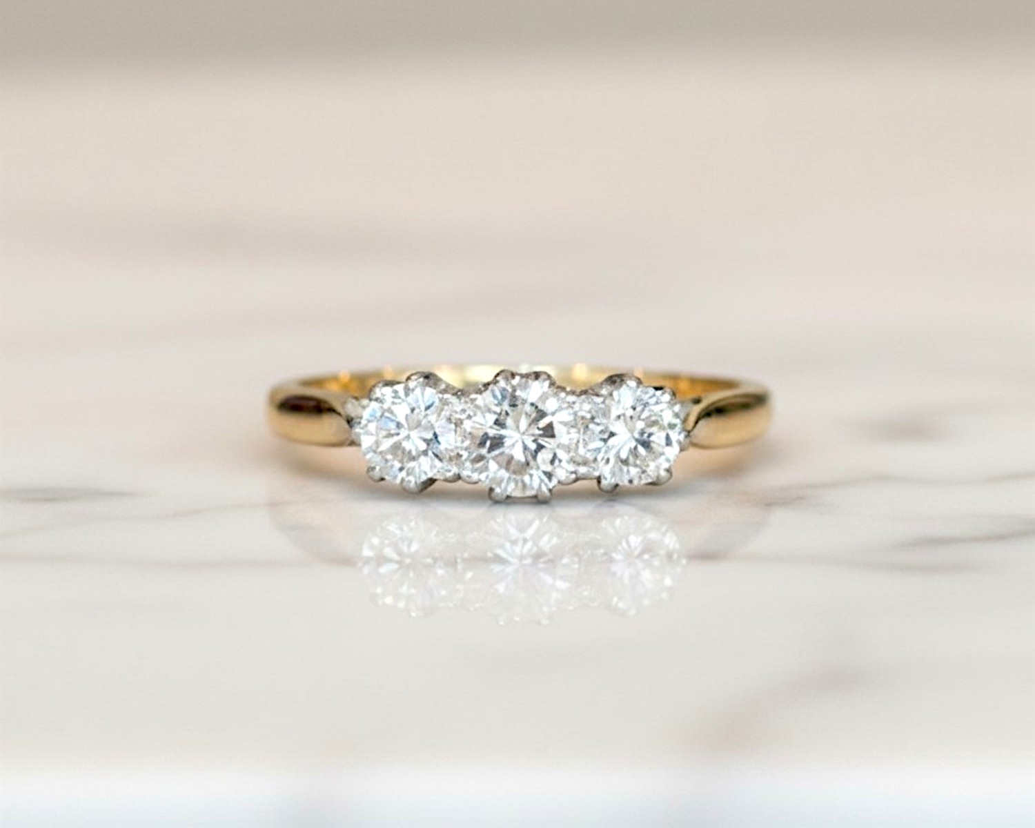 Antique 1930s diamond three stone ring in 18ct yellow gold and platinum for sale in Leeds