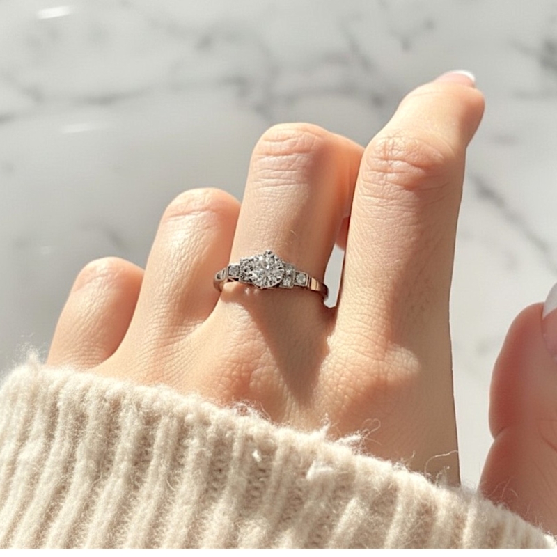 Art Deco platinum diamond solitaire ring 0.75ct for sale in Leeds, UK on model's hand