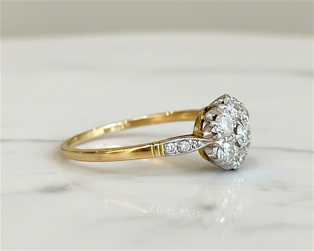 Antique Art Deco diamond cluster ring with old cut diamonds in 18ct yellow gold and platinum set, for sale in Leeds UK, showing side profile of the ring