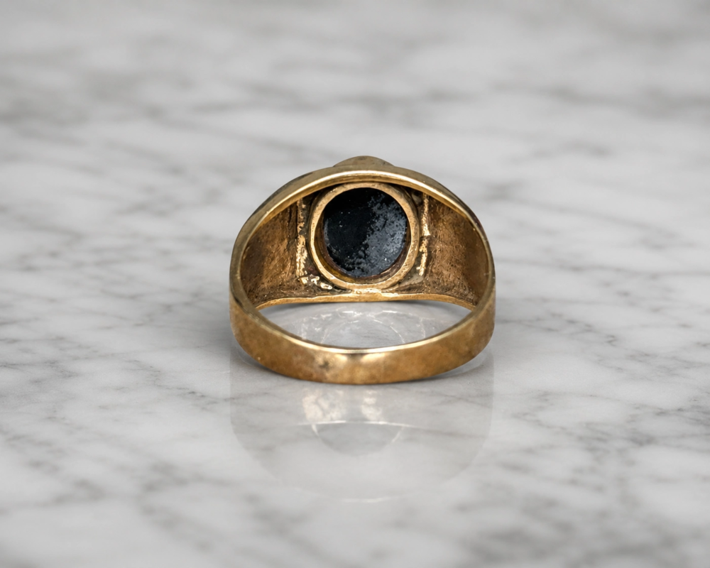 antique 1930s opal signet ring for a man or a woman in 9ct gold for sale in Leeds, showing back profile of the ring