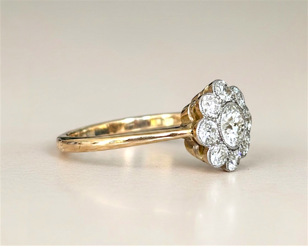 Edwardian diamond daisy cluster ring 1.25ct for sale in Leeds. 18ct yellow gold showing side view