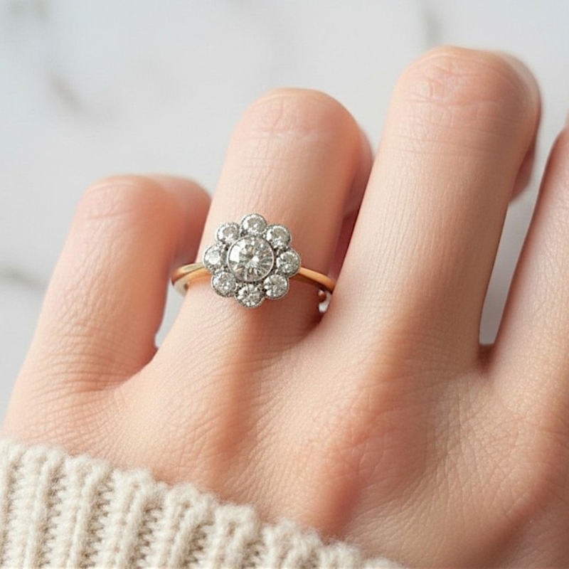 Edwardian diamond daisy cluster ring 1.25ct for sale in Leeds. 18ct yellow gold, shown on a model's hand