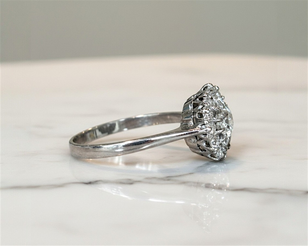 antique Edwardian old cut diamond cluster ring in 18ct white gold for sale in Leeds with approx 1.3ct diamond weight showing side profile of the ring