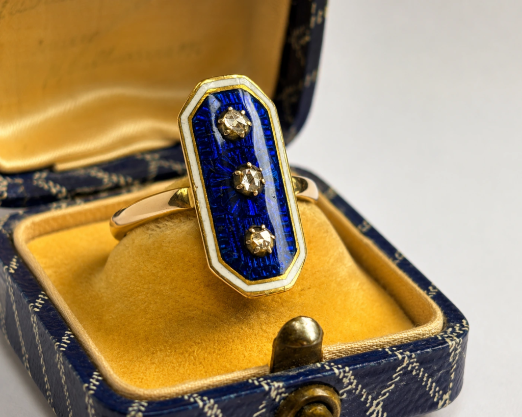 antique Victorian enamel and rose cut diamond panel ring ij 15ct gold for sale in Leeds shown in an antique blue box