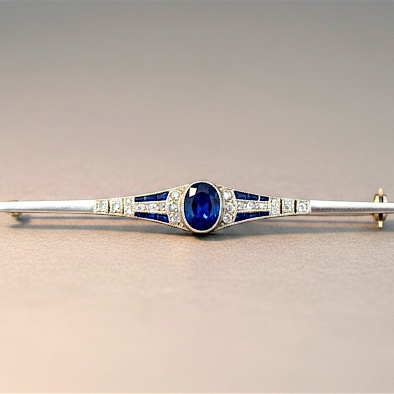 Art Deco sapphire and diamond bar brooch in 14ct gold for sale in Leeds, UK