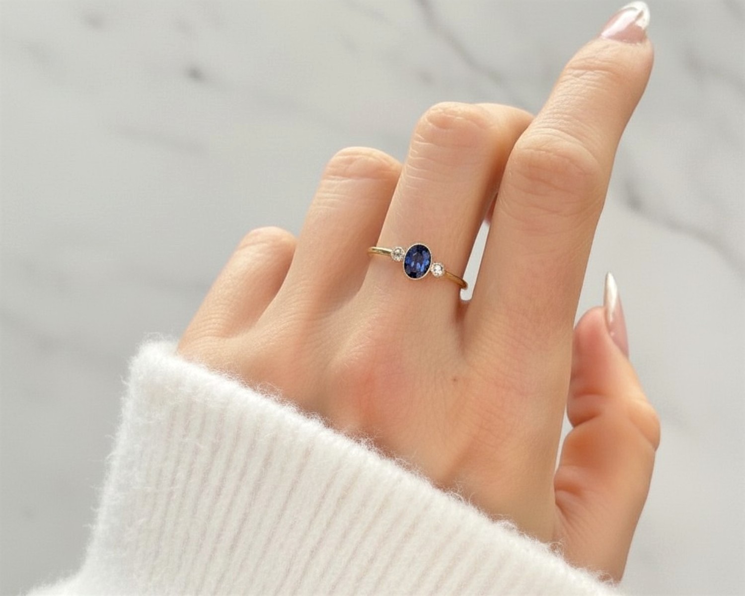 sapphire bezel set ring on model