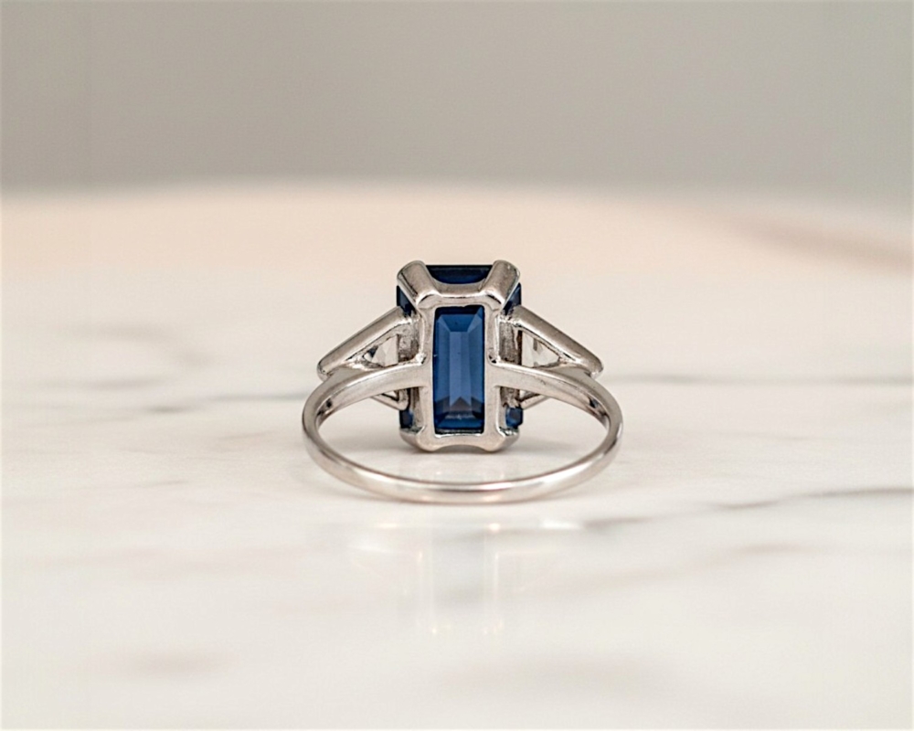 Art deco style sapphire and diamond ring with kite diamonds in 18ct white gold. Approx 5ct sapphire and 1ct diamond for sale in Leeds, showing rear view of the ring
