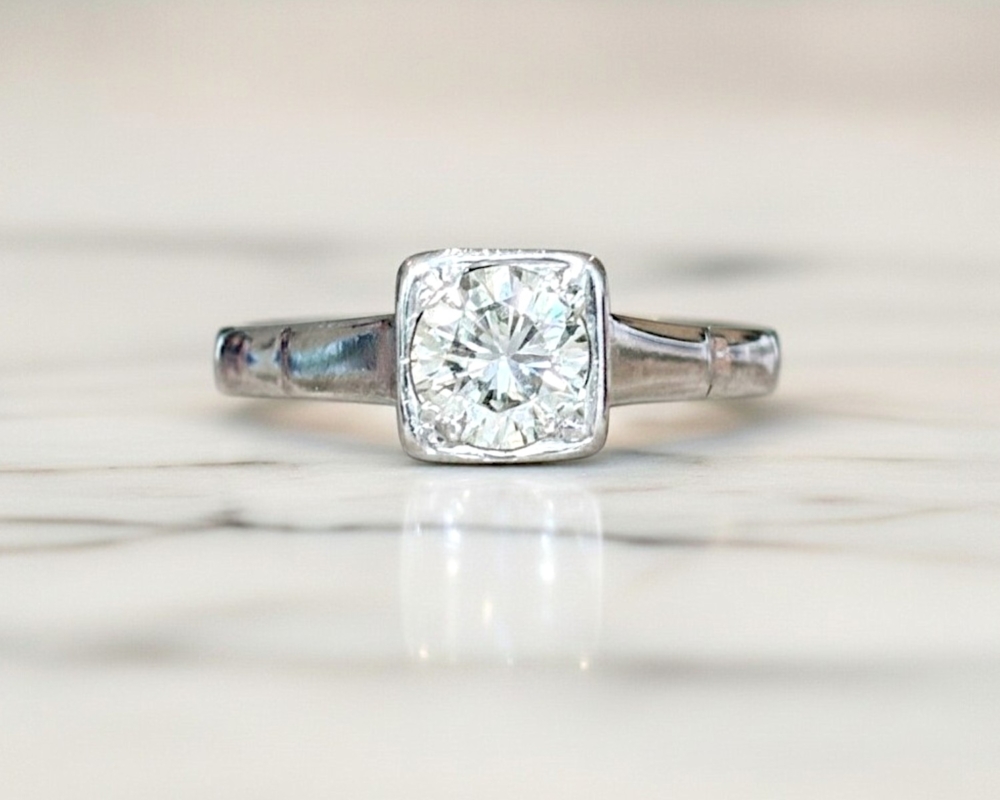 Art Deco 1930s diamond solitaire ring in an 18ct white gold square setting
