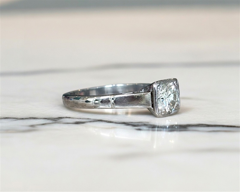 Art Deco 1930s diamond solitaire ring in an 18ct white gold setting with 0.75ct diamond for sale in Leeds, UK, showing side of the ring