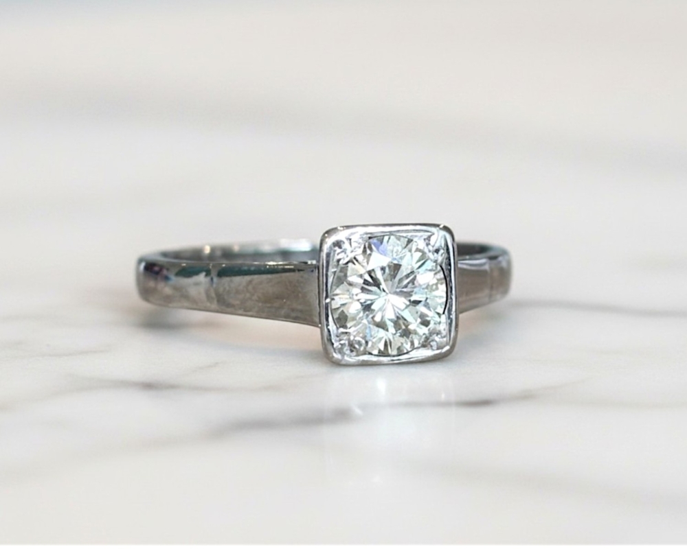 Art Deco 1930s diamond solitaire ring in an 18ct white gold setting with 0.75ct diamond for sale in Leeds, UK showing side of the ring