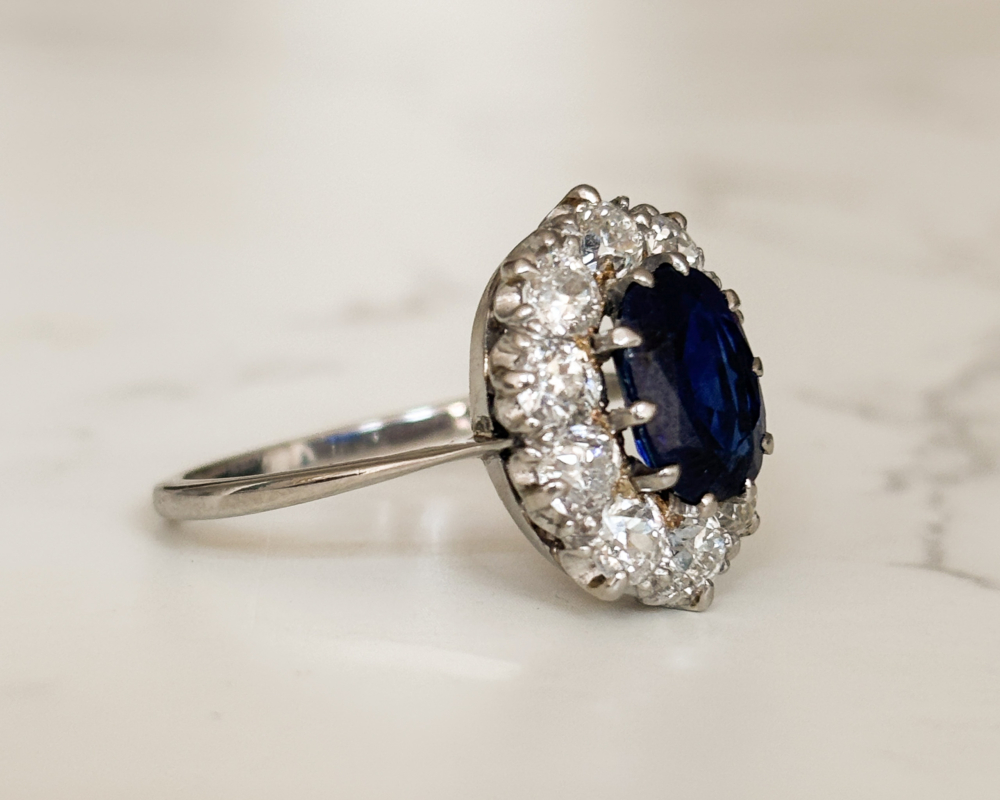 Antique Edwardian sapphire and diamond cluster ring in platinum for sale in Leeds showing side of the ring