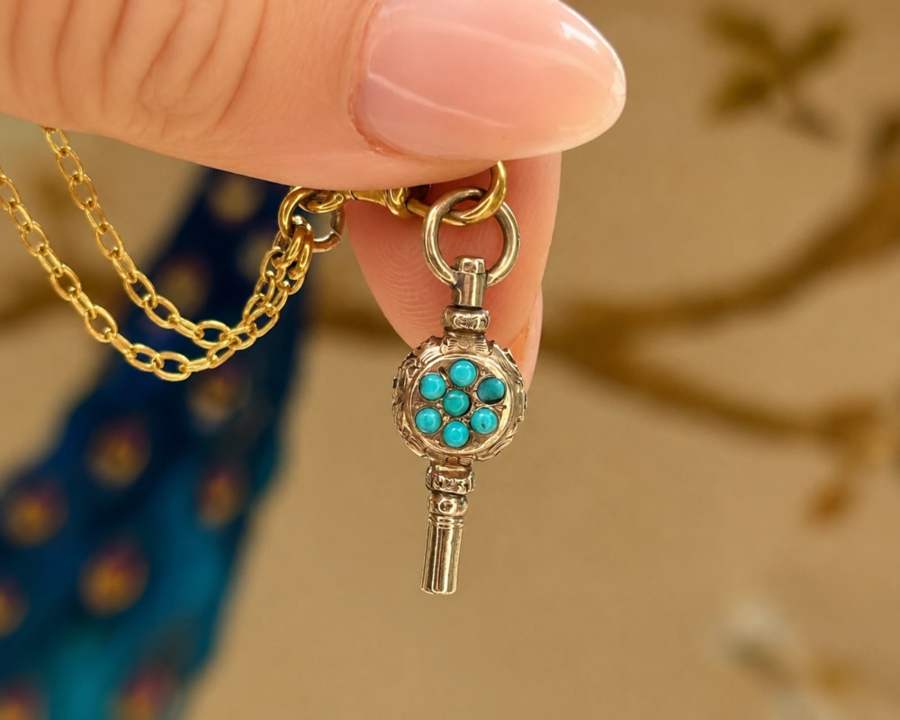 antique Victorian 9ct gold and turquoise long chain and key pendant for sale in Leeds, showing key up close