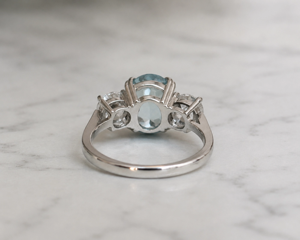 Vintage style aquamarine and diamond three stone ring for sale in Leeds showing back view