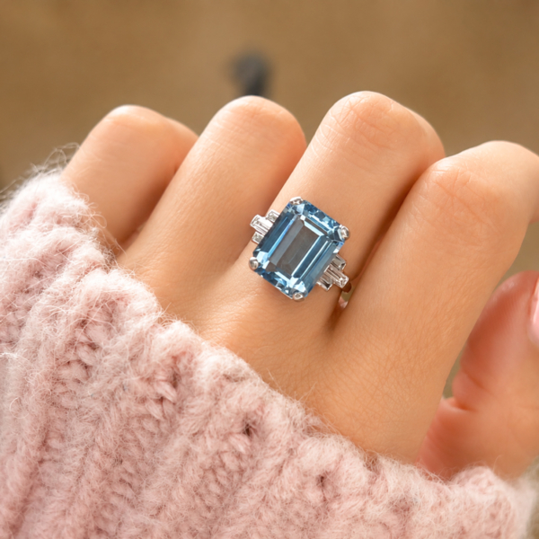 art deco aquamarine and diamond ring for sale in Leeds, shown on a model's hand
