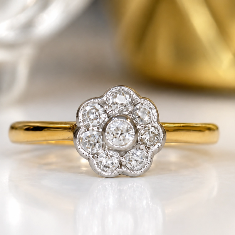 antique diamond daisy ring with old cut diamonds in 18ct gold and platinum for sale in Leeds