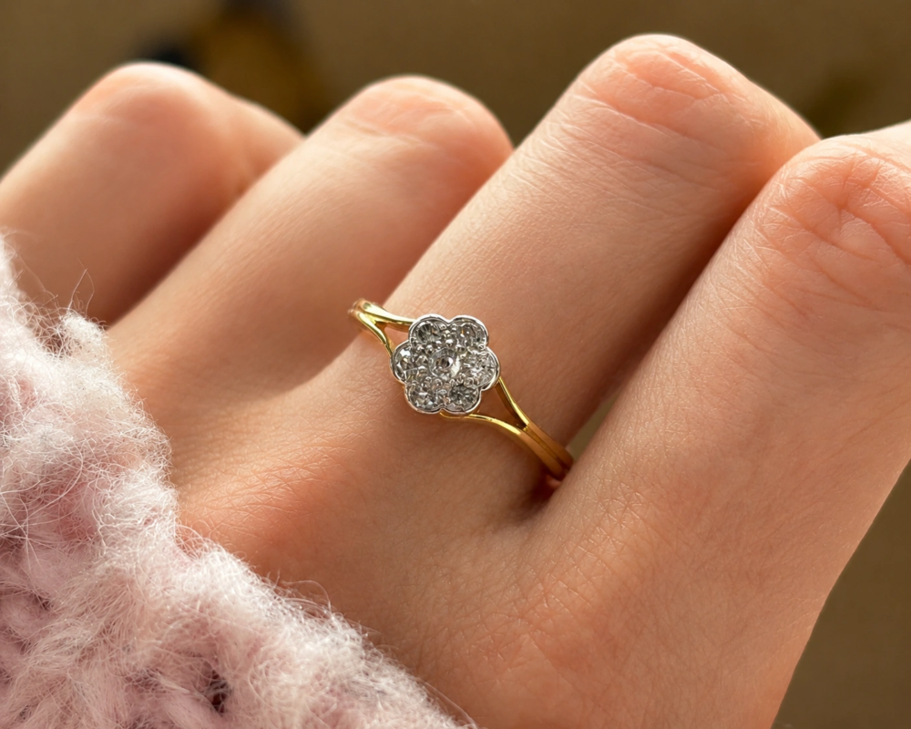 Art Deco daisy ring with split shank 18ct gold shoulders for sale in Leeds on hand