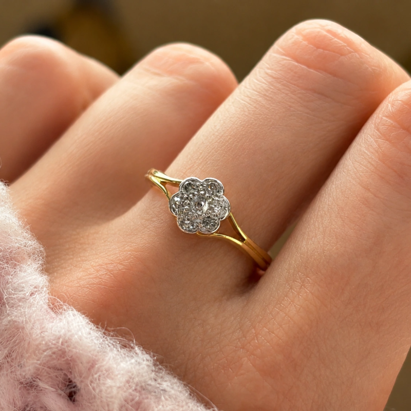 Art Deco daisy ring with split shank 18ct gold shoulders for sale in Leeds on hand