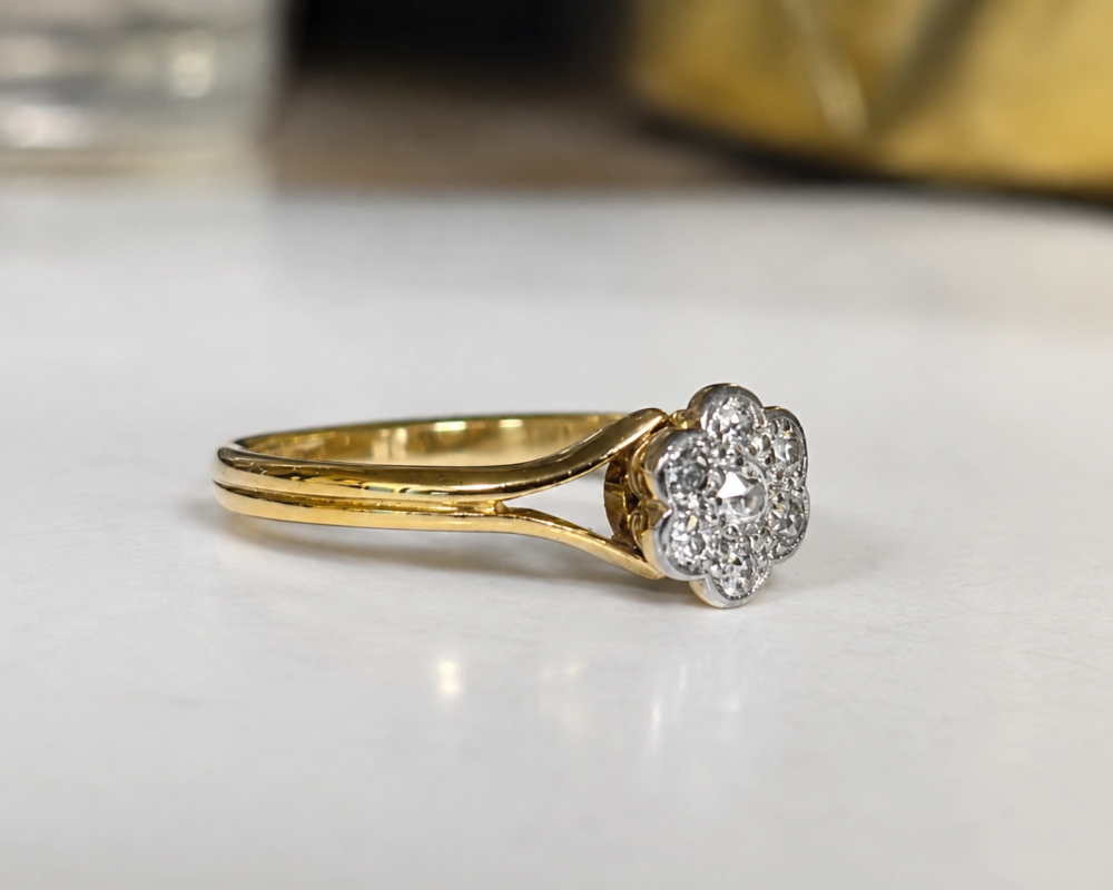 Art Deco daisy ring with split shank 18ct gold shoulders for sale in Leeds, side view