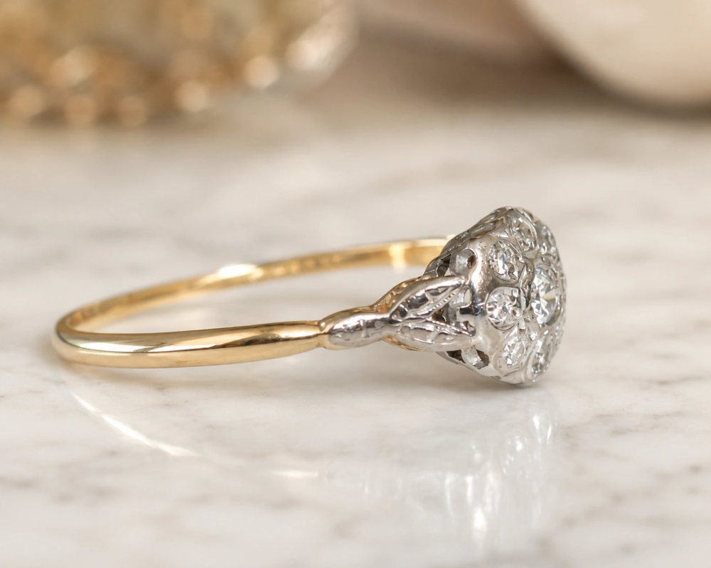 antique 1930s diamond cluster ring in 18ct yellow gold and platinum for sale in Leeds, showing side profile