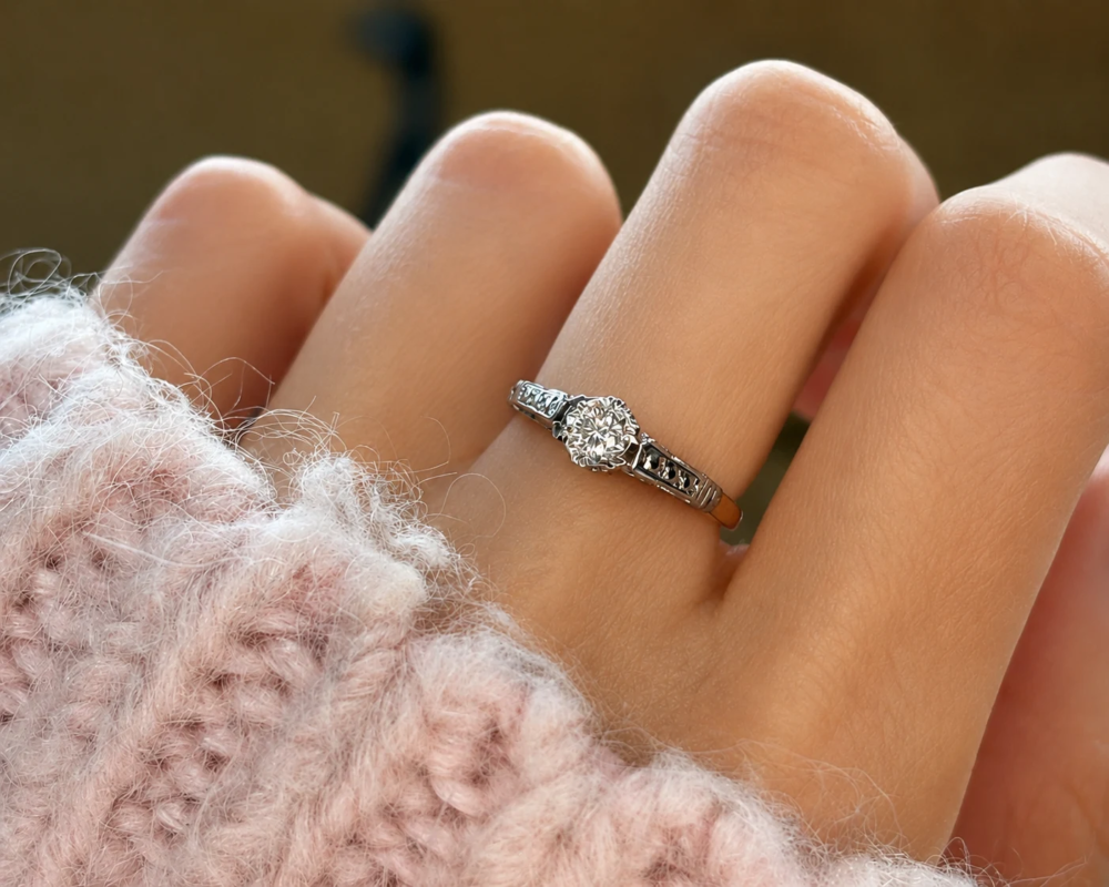 antique 1930s 18ct gold diamond solitaire with platinum shoulders for sale in leeds on model's hand