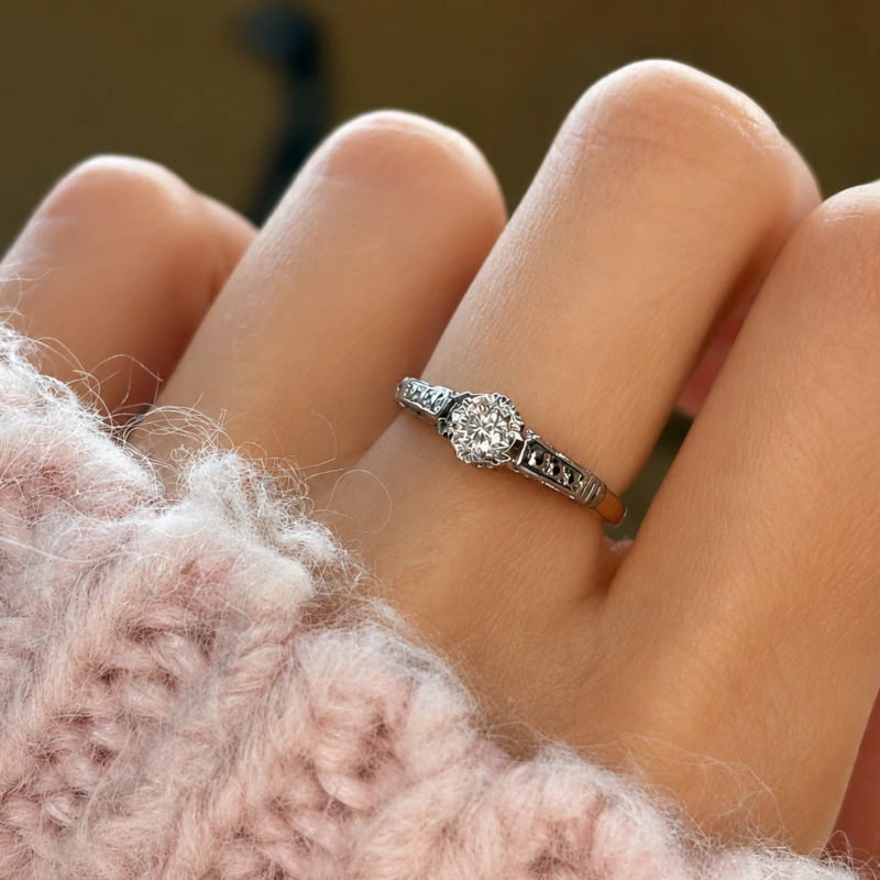 antique 1930s 18ct gold diamond solitaire with platinum shoulders for sale in leeds on model's hand