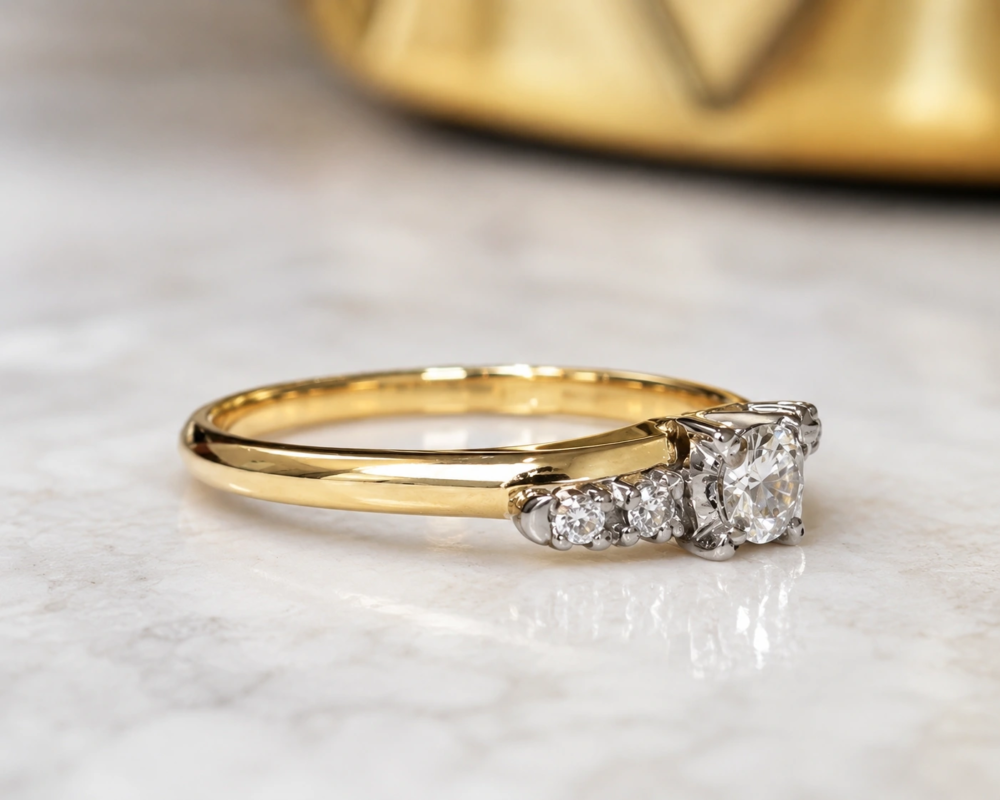 antique 1930s diamond ring with diamond shoulders showing side view