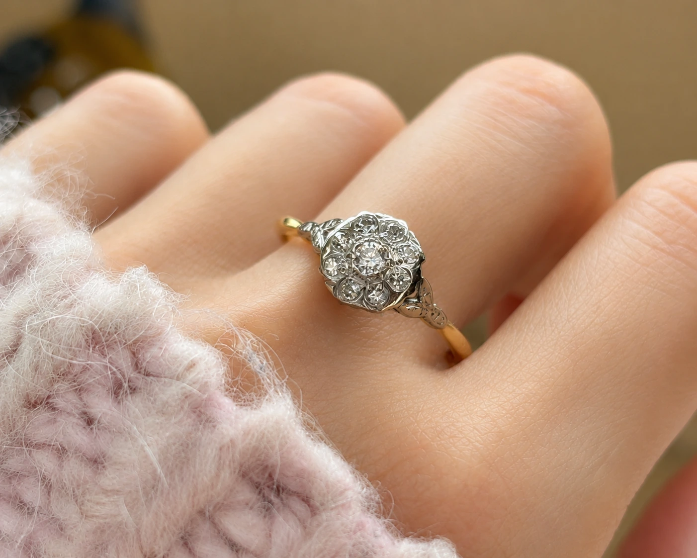 large diamond clueter ring on hand