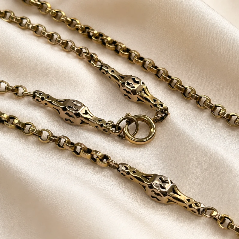 Victorian long 9ct gold chain with decorative panels for sale in Leeds