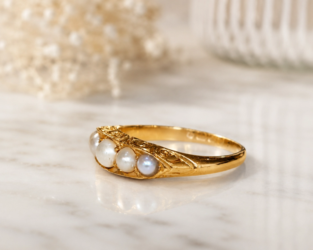 Victorian seed pearl half hoop ring in 18ct gold dated 1899. For sale in Leeds, side view of the ring