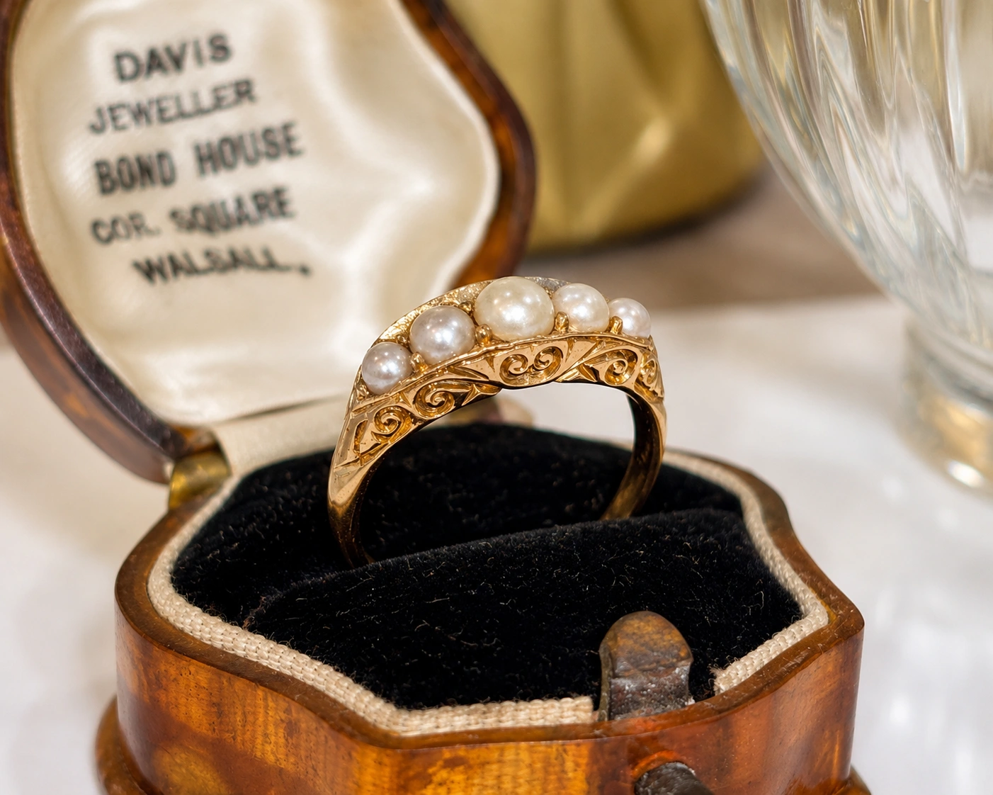 pearl ring in box