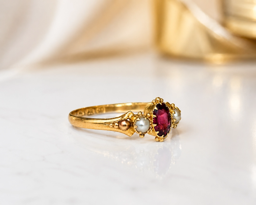 antique Victorian ruby and pearl ring in 18ct gold dated 1850 for sale in Leeds, showing side of the ring