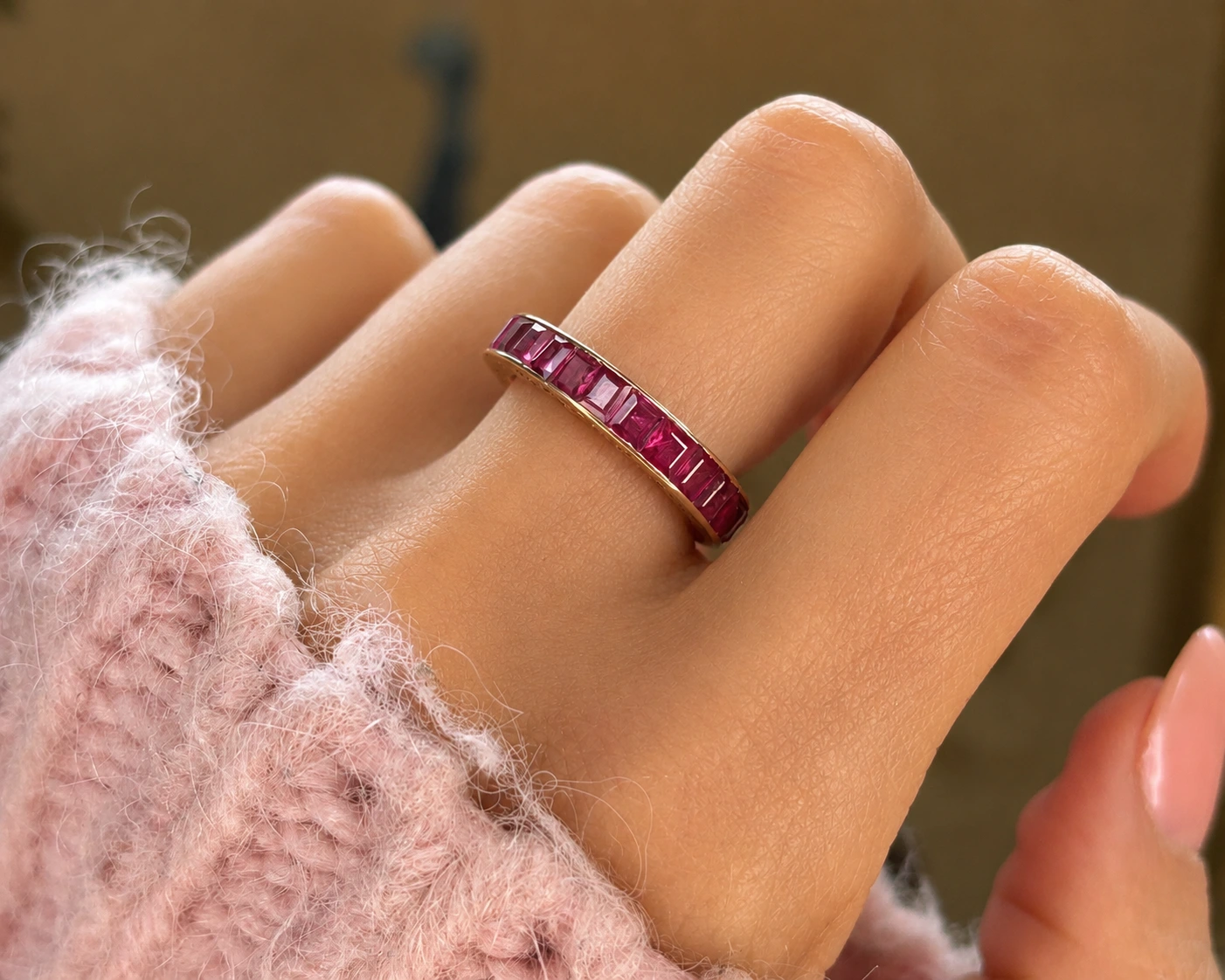ruby ring on finger