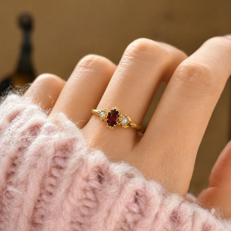 antique Victorian ruby and pearl ring in 18ct gold dated 1850 for sale in Leeds shown on a woman's finger
