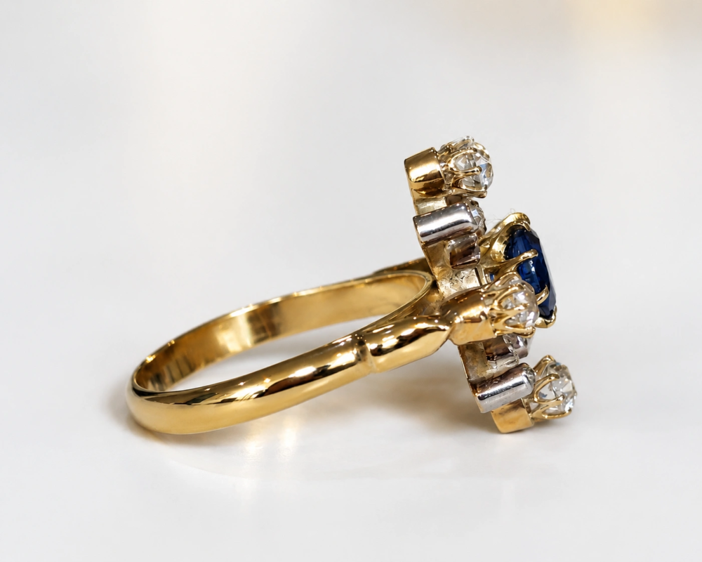 antique Edwardian sapphire and diamond cocktail ring in 18ct gold for sale in Leeds showing side view