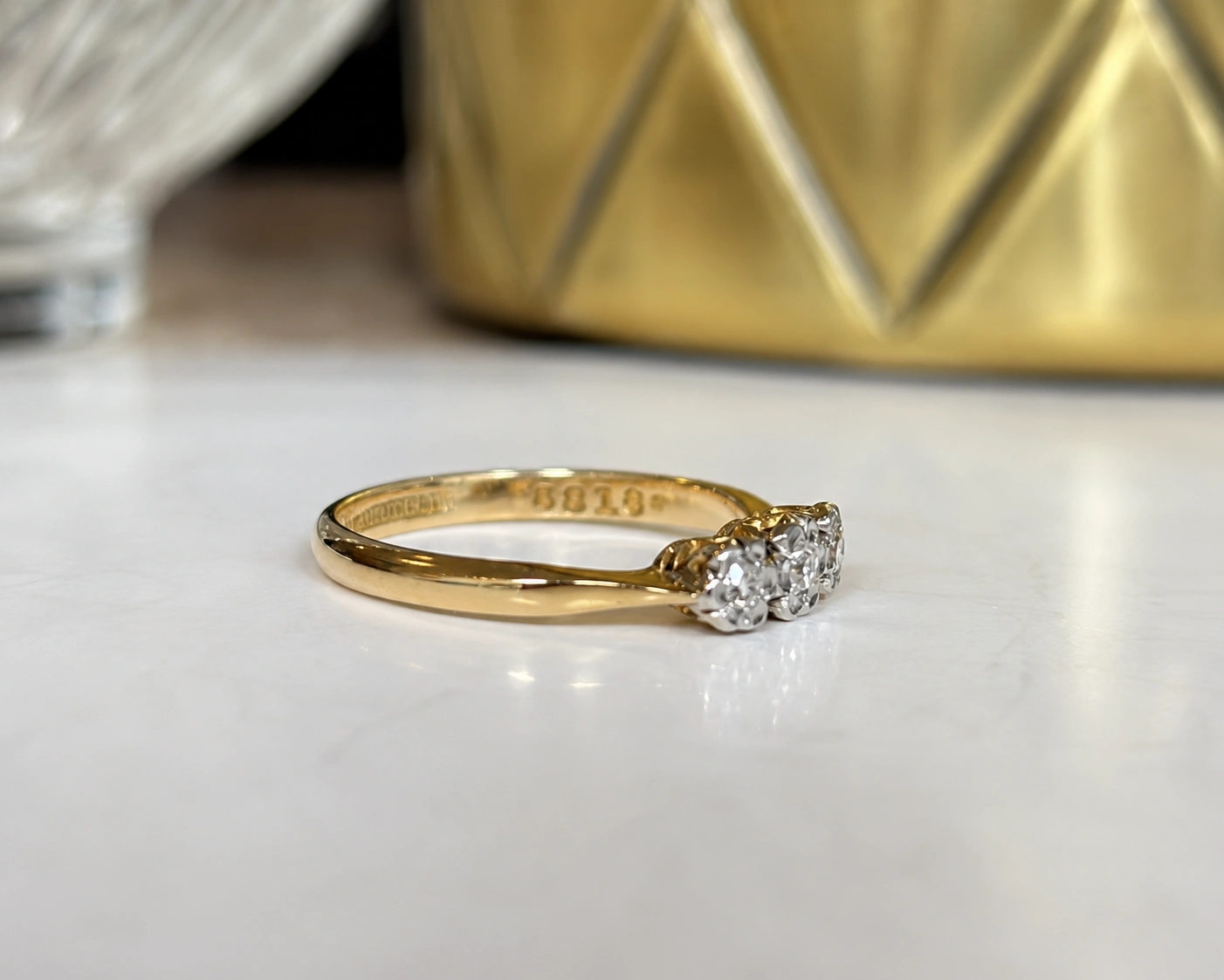 side view three stone cluster ring