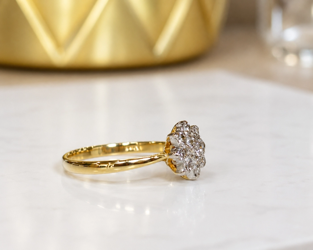 vintage star shaped diamond cluster ring in 18ct yellow gold for sale in Leeds showing side profile