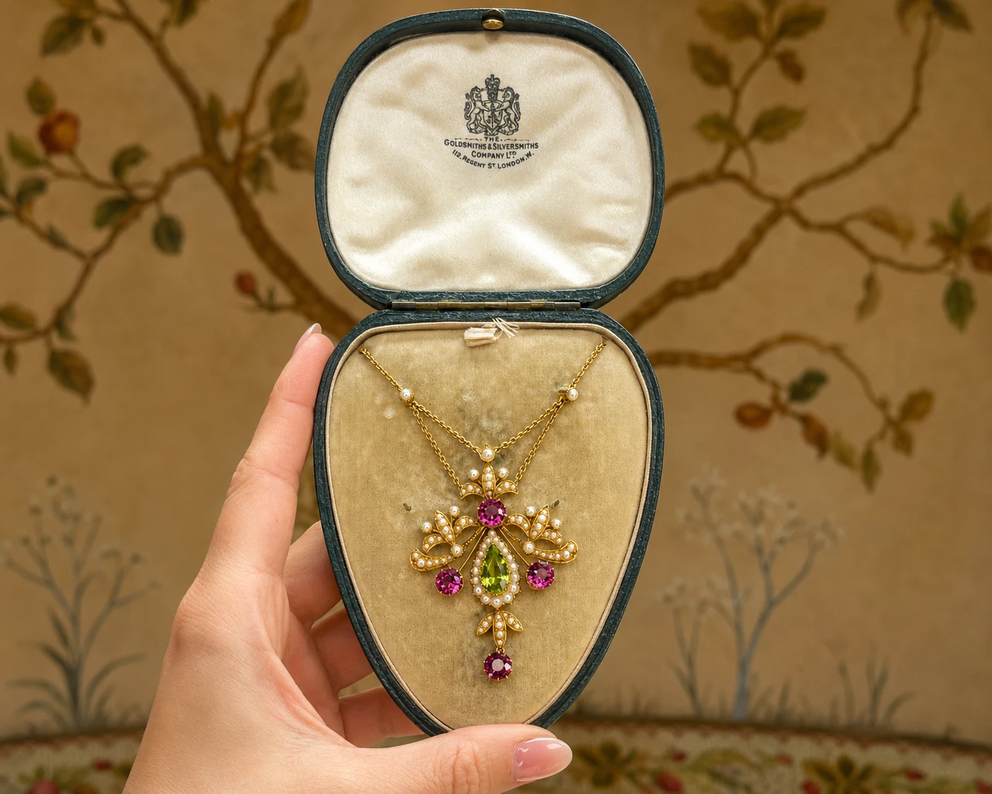 suffragette necklace held in box