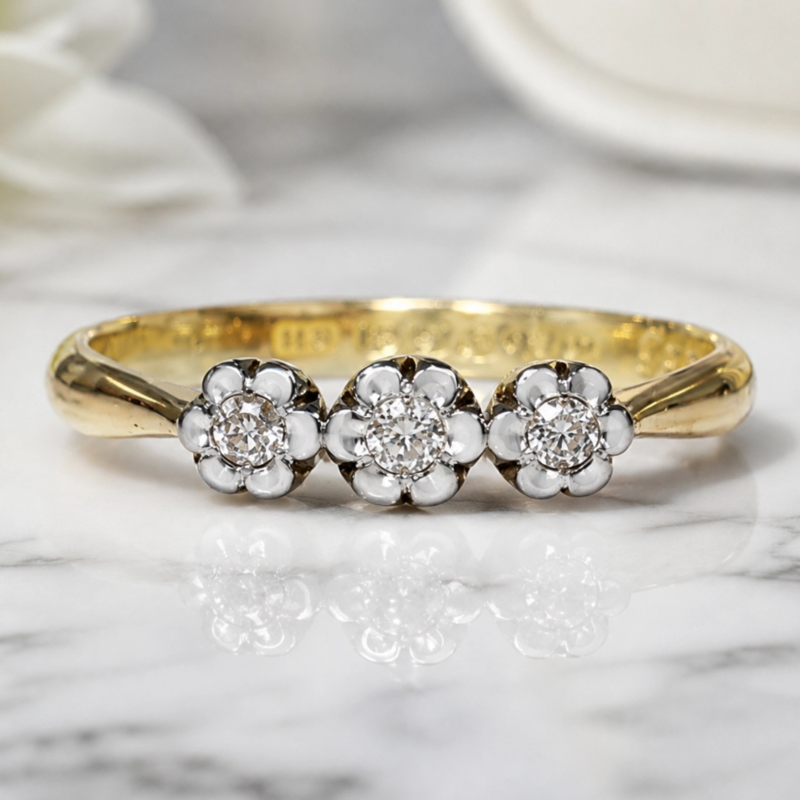 antique 1930s three stone diamond cluster ring in 18ct yellow gold and platinum for sale in Leeds