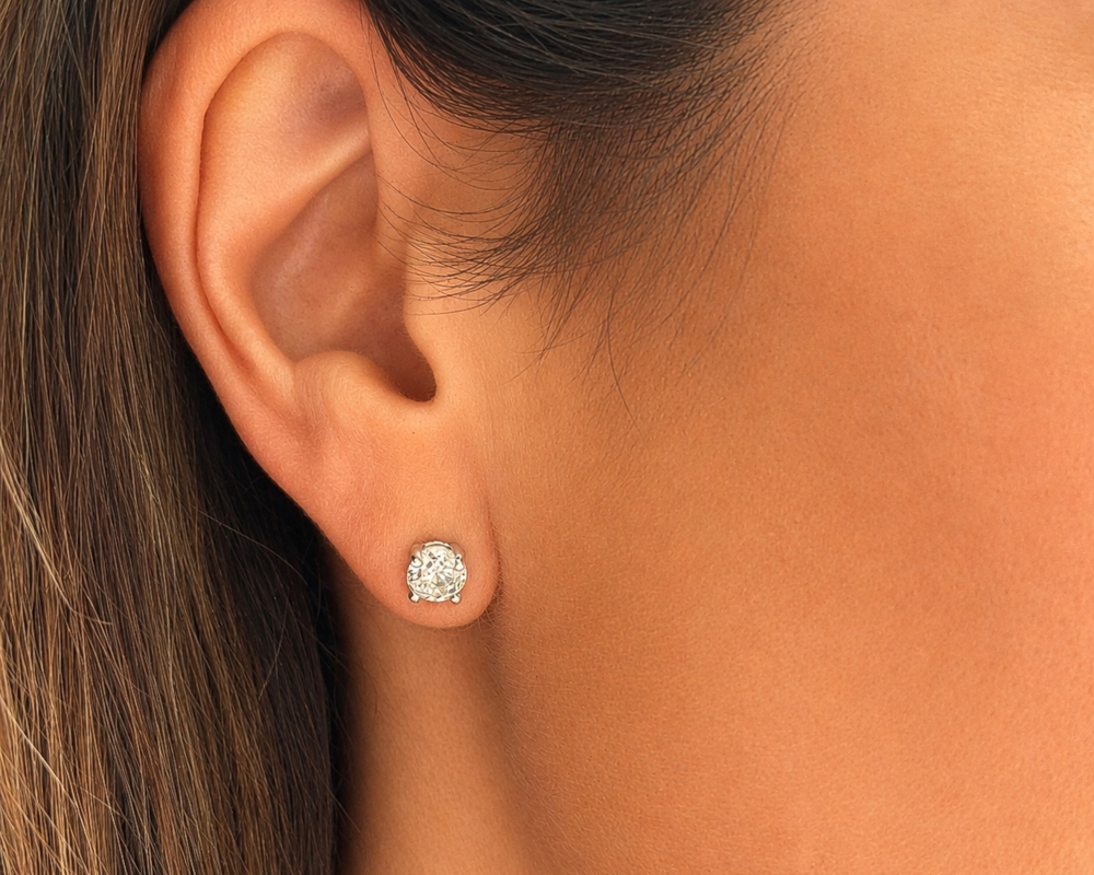 vintage 1.66ct diamond studs in 18ct white gold circa 1970s for sale in Leeds in model's ear